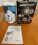 Waterpik WP-100W Ultra Designer Countertop Flosser White & Blue. Fixed Price $22.50.