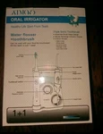 Water Flosser, Atmoko 600ML Oral Irrigator & Electric Toothbrush With 7 Multifun. Fixed Price $34.99.