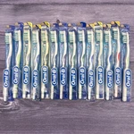14 Lot 2002 Oral Advantage Plus Toothbrush Regular 40 Medium Control Grip Nos. Fixed Price $64.99.