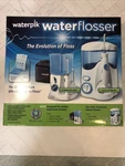 Waterpik Waterflosser Ultra & Traveler #778082 Contents Sealed. Fixed Price $59.95.