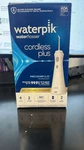 Waterpik Cordless Plus Flosser - White. Fixed Price $23.99.