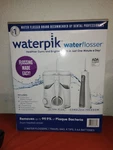 Waterpik Ultra Plus & Cordless Freedom Flossers, Tips, Travel Case. Fixed Price $45.00.
