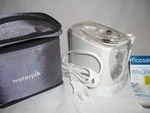Waterpik Portable Flosser Model WP-250. Fixed Price $44.99.