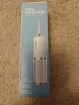 Liberex FC2660 Cordless Portable Oral Irrigator Water Flosser - White. Fixed Price $15.00.