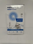 Waterpik Cordless Advanced Flosser For Teeth Gums Rose Gold WP-569. Fixed Price $34.99.