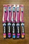 5 Reach Total Care Floss Clean Toothbrush- Soft Assorted Colors. Fixed Price $8.99.