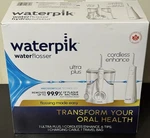 Waterpik Flosser Cordless Enhance Ultra Plus Set. Fixed Price $47.03.