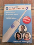 Profloss Waterflosser, White. Fixed Price $5.00.