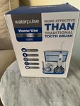 New Electric Flosser 800ML 5 Jet Pick Tips Oral Irrigator V300 Waterpulse. Fixed Price $45.00.