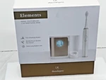 Dazzlepro Elements Sonic Toothbrush New Sealed Gold. Fixed Price $75.00.