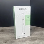 Boka White Power Brush And 2 Pack Of Replacement Heads. Fixed Price $39.99.