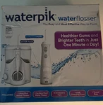 Waterpik Ultra Plus & Cordless Pearl Flosser Combo Pack W/bag And Charger. Fixed Price $35.87.