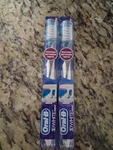 2 New Oral 3D Crisscross Bristles Whitens Between Teeth Toothbrushes. Fixed Price $9.99.