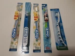 Lot 5 Kids Oral Disney Baby Winnie The Pooh Mickey Mouse Soft Toothbrushes. Fixed Price $15.99.