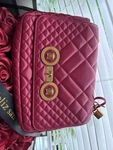 Versace Pink Quilted Shoulder Bag Gold Medusa Head Hardware Chain Strap. Fixed Price $500.00.