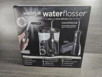 Waterpik Flosser Ultra WP-112W Cordless Plus WP-462W Combo Travel Case. Fixed Price $69.99.