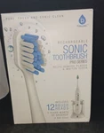 Pursonic S430 Toothbrush White + 11 Sealed Heads Open Box. Fixed Price $29.95.