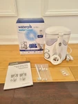 New Waterpik Ultra Dental Easy Flosser 6 Tips & Settings WP-100W White. Fixed Price $49.99.