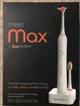 Max Flossolution Sonic Brushing Flossing System.. Brand New Box Sealed.... Fixed Price $75.00.
