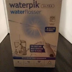 *waterpik WP-100W White Ultra Flosser. Fixed Price $63.50.