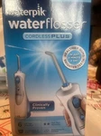 Waterpik Waterflosser Cordless Plus White Model- WP-460W- Tips Included. Fixed Price $35.00.