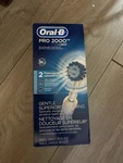 Oral-b Pro 2000 Crossaction Rechargeable Electric Toothbrush, White. Fixed Price $54.88.
