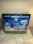 Waterpik Waterflosser Ultra And Traveler # 778082 New!. Fixed Price $59.99.
