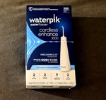 Waterpik Waterflosser Cordless Enhance 3000 - White. Fixed Price $29.99.