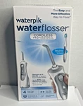 Waterpik Cordless Flosser Professional WP-440 Open Box New Complete. Fixed Price $44.97.