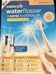 Waterpik WP-861W Complete Care 5.0 Flosser Sonic Toothbrush White. Fixed Price $75.00.