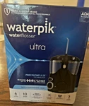 Waterpik Ultra Countertop Flosser Oral Irrigator, Black New. Fixed Price $34.94.