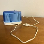 Waterpik Flosser Model WP-65W Oral Hygiene Unit With Attachments. Fixed Price $30.00.