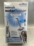 Waterpik Flosser Cordless Wp- 440C With Nano-sonic Toothbrush Nib. Fixed Price $43.49.