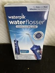 Waterpik Cordless Plus Waterflosser WP-463W Rechargeable Nib. Fixed Price $76.00.