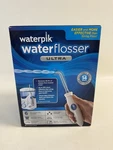 Waterpik Flosser Ultra WP-100W Sonic Toothbrush New & Sealed. Fixed Price $49.50.