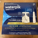 Waterpik Flosser Ultra Plus + Cordless Enhance 3000 Set New Sealed. Fixed Price $65.00.