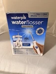 Waterpik Waterflosser Ultra Model WP-100W Nib Sealed White Blue Countertop Unit. Fixed Price $42.99.