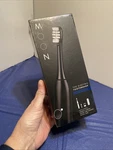 Moon Sonic Electric Toothbrush For Adults, 5 Smart Modes Black-sealed. Fixed Price $59.99.