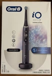 Nib Oral-b Io Series 7L Electric Toothbrush 2 Heads Black Onyx. Fixed Price $139.50.
