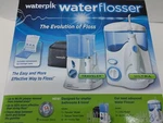 Waterpik Waterflosser Ultra And Traveler # 778082. Fixed Price $69.33.