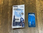 Waterpik WP-563 Cordless Advanced Flosser + Pocket Tips. Fixed Price $49.99.
