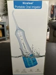 Nicefeel Wireless Portable Water Flosser Oral Irrigator With 4 Tips (5). Fixed Price $22.99.