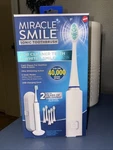 Miracle Smile Sonic Toothbrush 5 Speeds Usb Charging Dock 6 Heads. Fixed Price $27.99.