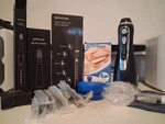 Phylian Electric Toothbrush With 8 Replacement Brushes And Waterpik Flosser Set. Fixed Price $45.99.