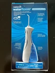 Waterpik Waterflosser Cordless Plus + Tips Dual Pressure Control WP-460W. Fixed Price $44.99.