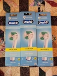 Oral Daily Clean Electric Toothbrush White Color 3X6 Packs 18 Heads. Fixed Price $10.00.