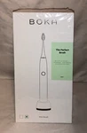 Boka White Power Brush And 2 Pack Of Replacement Heads. Fixed Price $40.00.