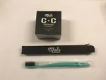 Molr Dental Club + Carbon Coconut Teeth Whitening Powder & Toothbrush Set. Fixed Price $31.95.