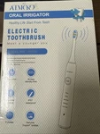 Atmoko Water Flosser, 600ML Oral Irrigator & Electric Toothbrush. White. Fixed Price $49.00.