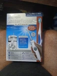 Waterpik Flosser Platinum With Nano Sonic Toothbrush And 6 Tips Sealed Box. Fixed Price $96.00.